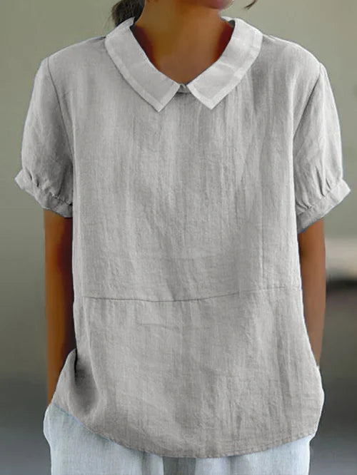 Blusa fluida con cuello alto y corte relajado – ÉLISA
