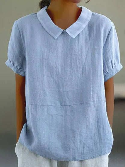 Blusa fluida con cuello alto y corte relajado – ÉLISA