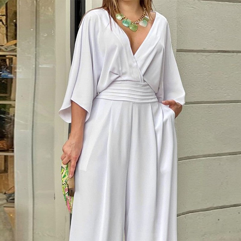 Mono elegante de estilo relajado con manga tres cuartos – NAÏMA